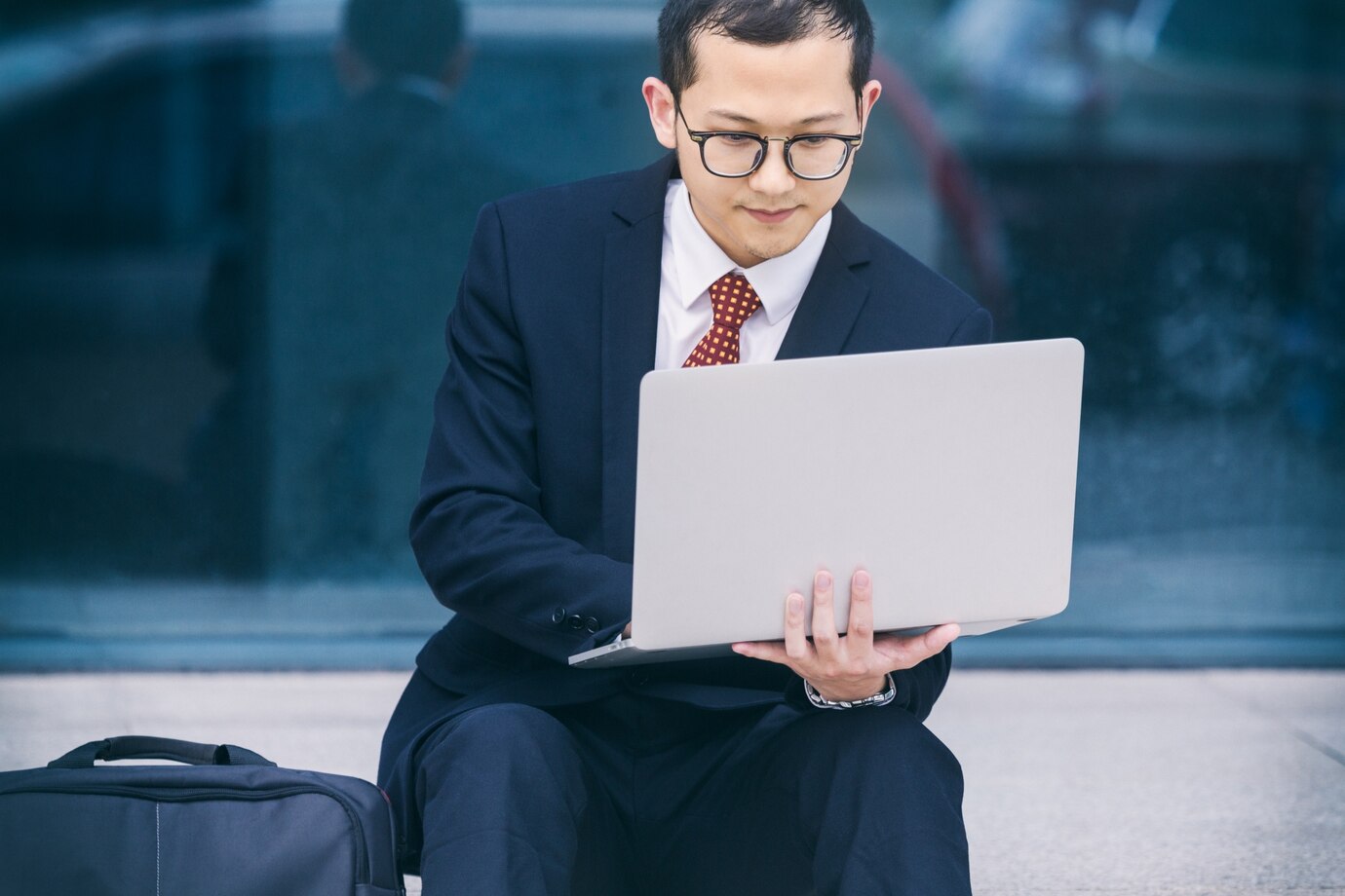 Business men use laptops