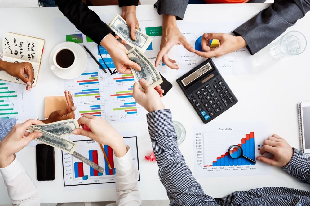 businessmen hands on white table