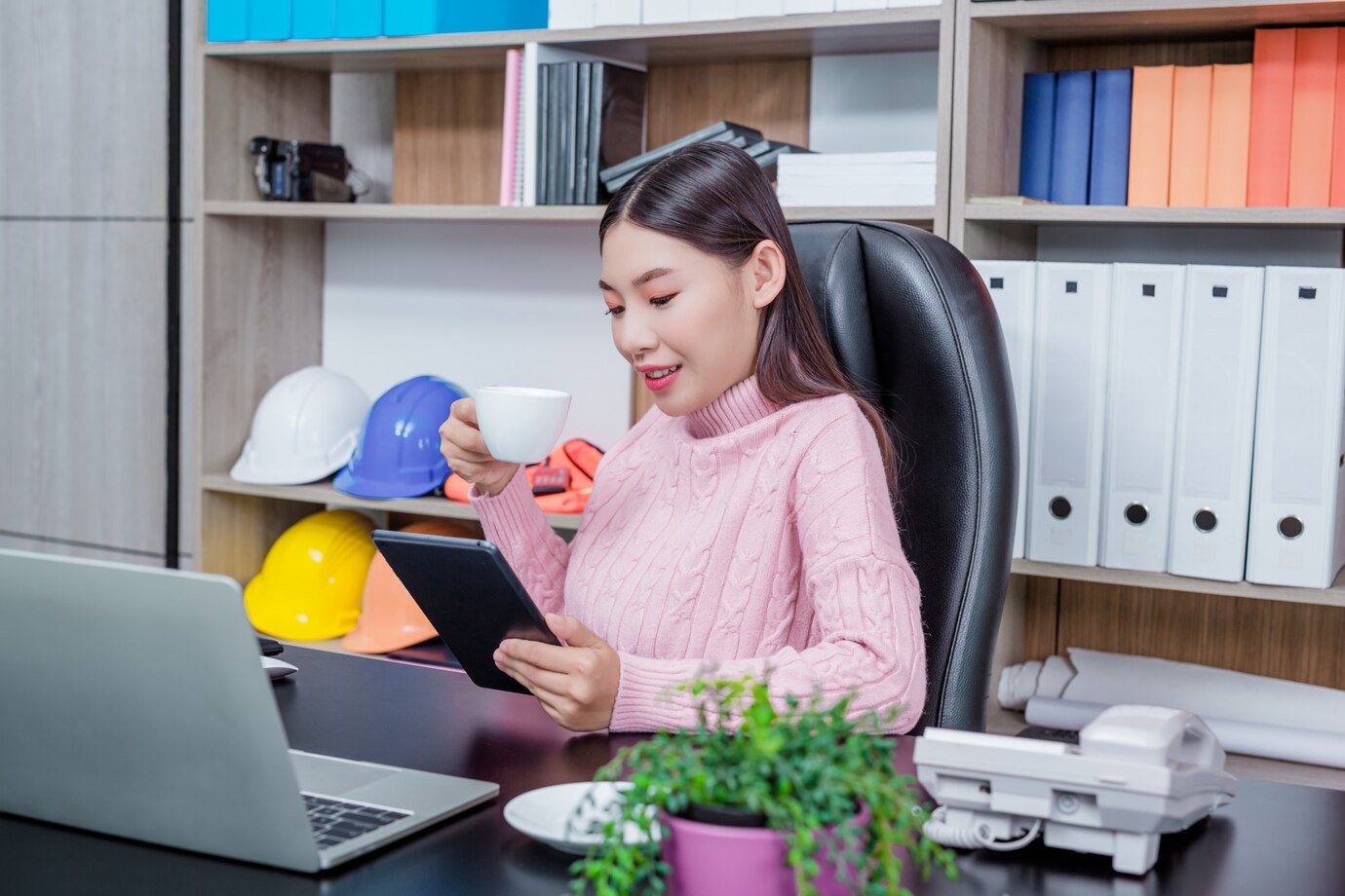 Young woman working office