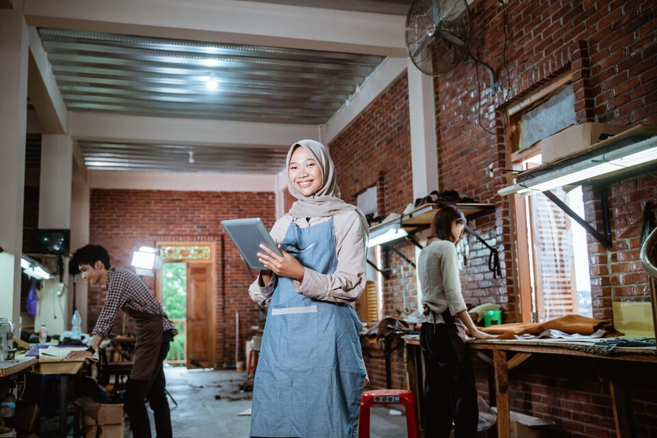 A portrait of Asian woman ecommerce employee freelance with parcel box