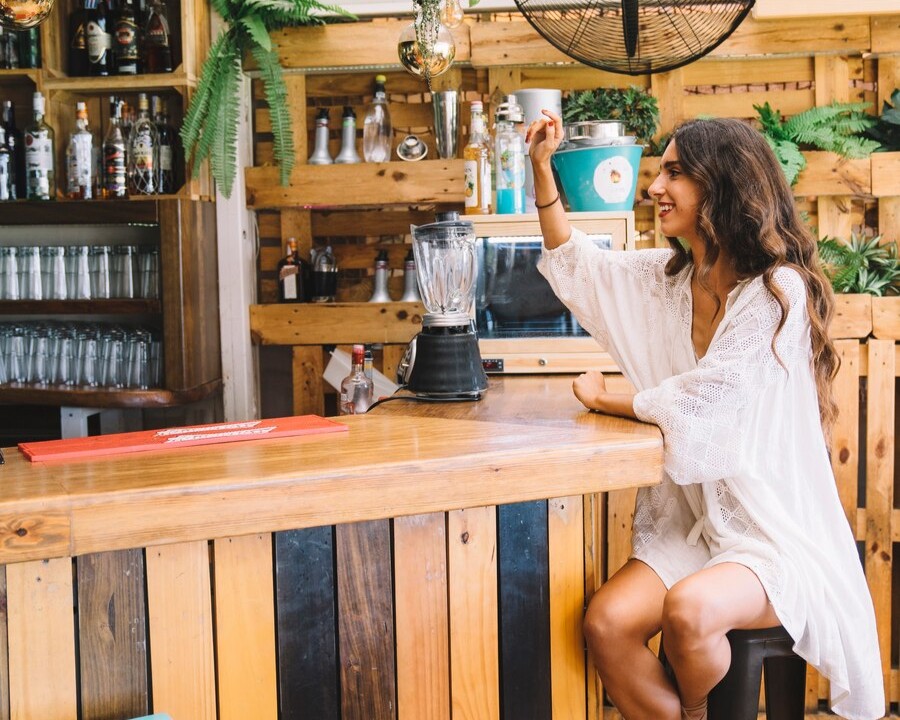 Woman ordering at bar