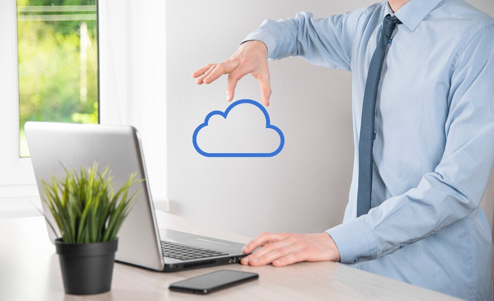 Businessman hand holding cloud