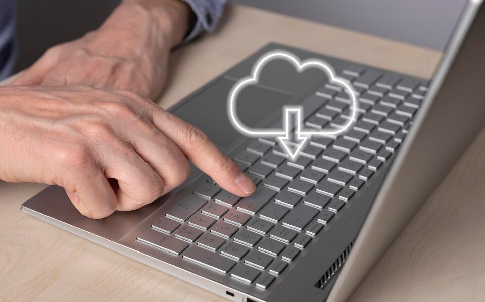 Cloud computing man using laptop for download files from remote