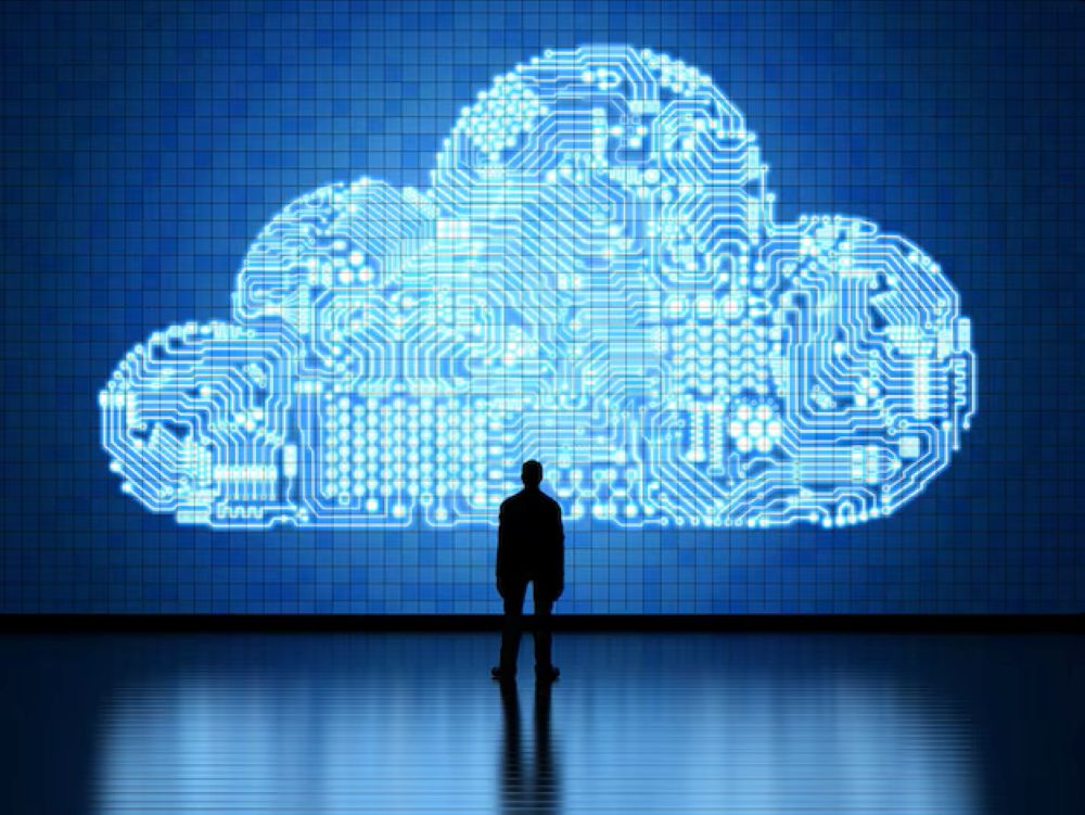 Man holding virtual cloud computing