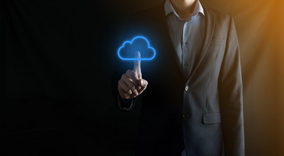 Businessman hand holding cloud computing