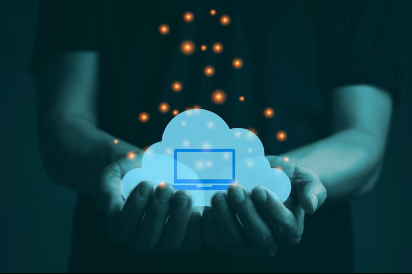 The hand holding the cloud with laptop icon