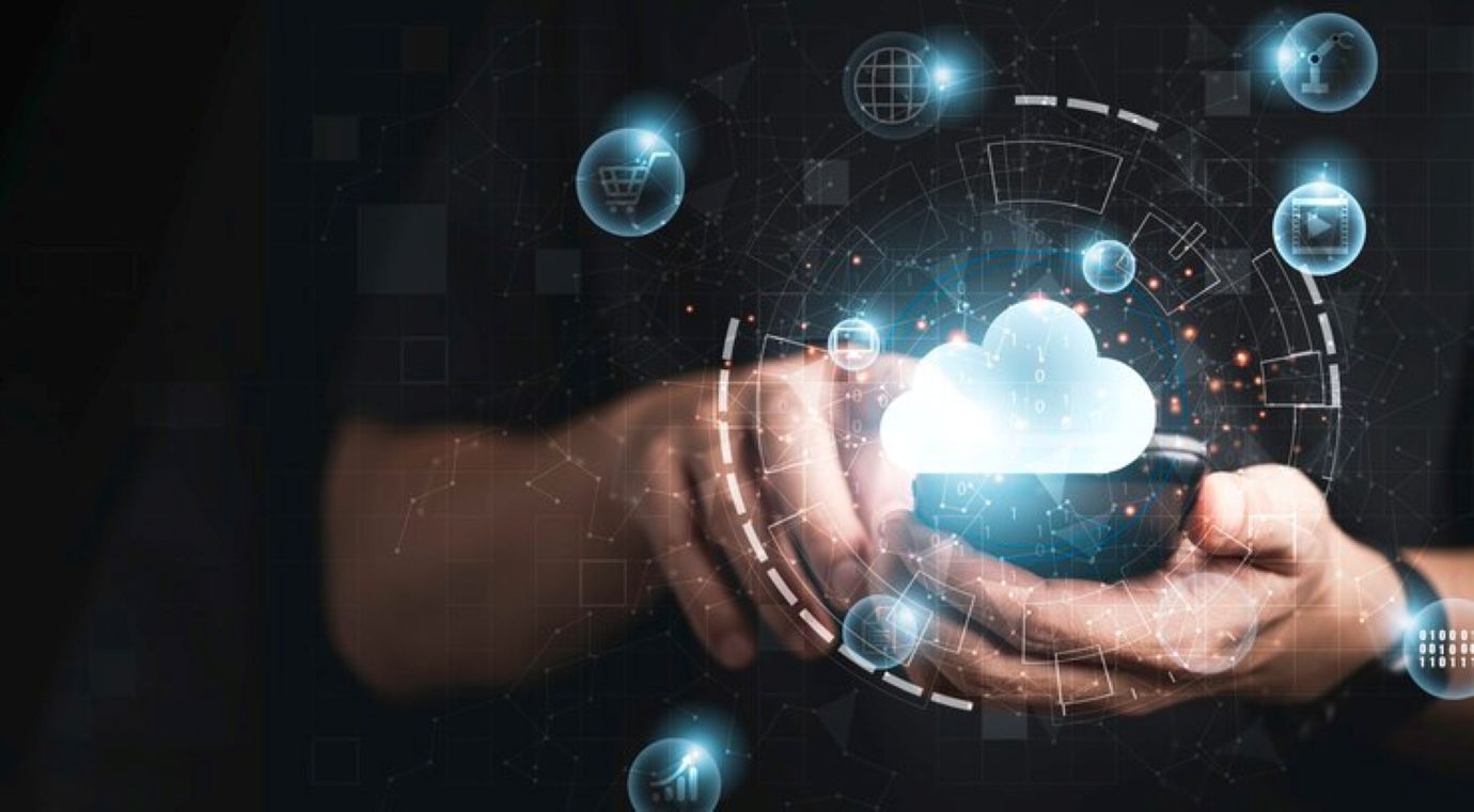 Businessman using smartphone with virtual cloud computing technology